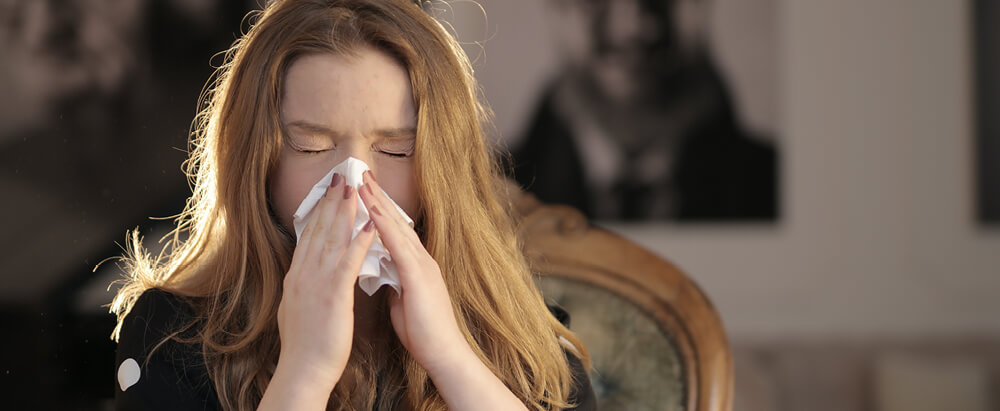 Sneezing Woman
