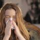 Woman Sneezing