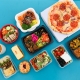Variety of food and dishes on a blue background
