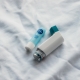 Chapstick next to an inhaler
