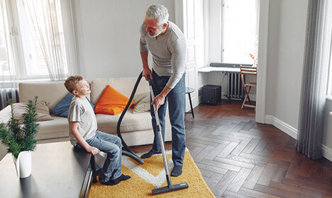 Man Cleaning House